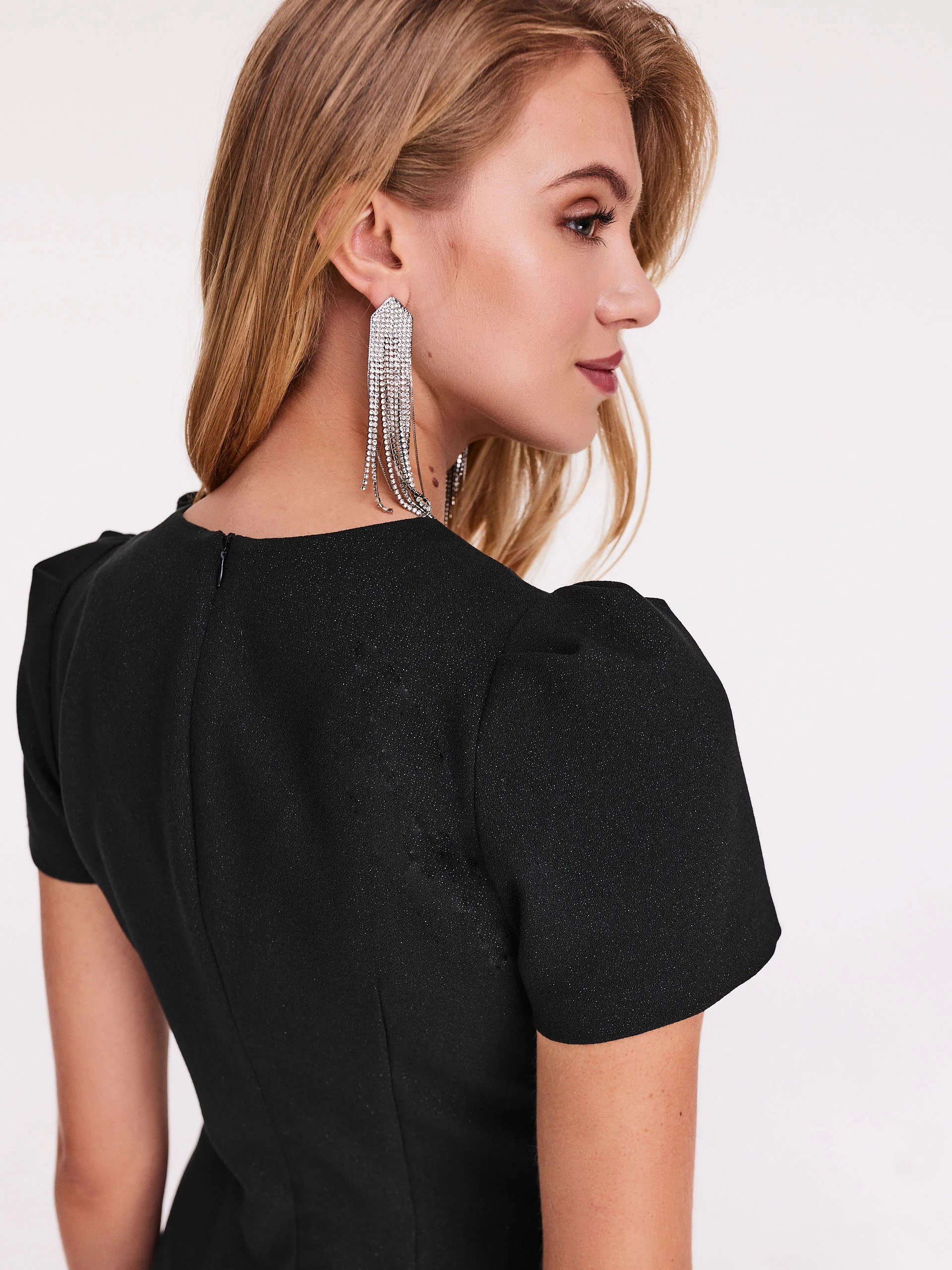 Glittering dress with buffets and ruffles