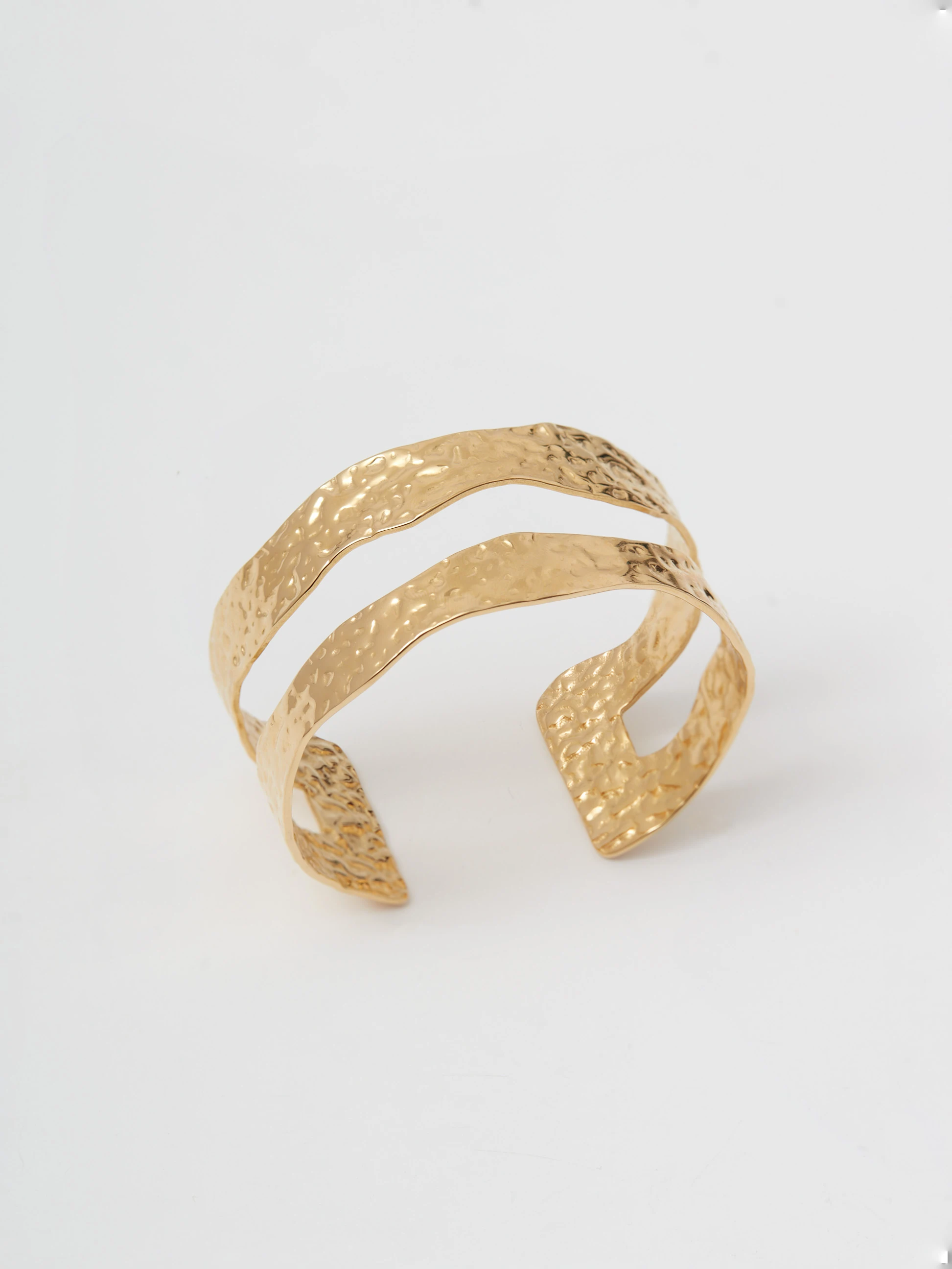 Pozłacana bransoletka o artystycznej fakturze