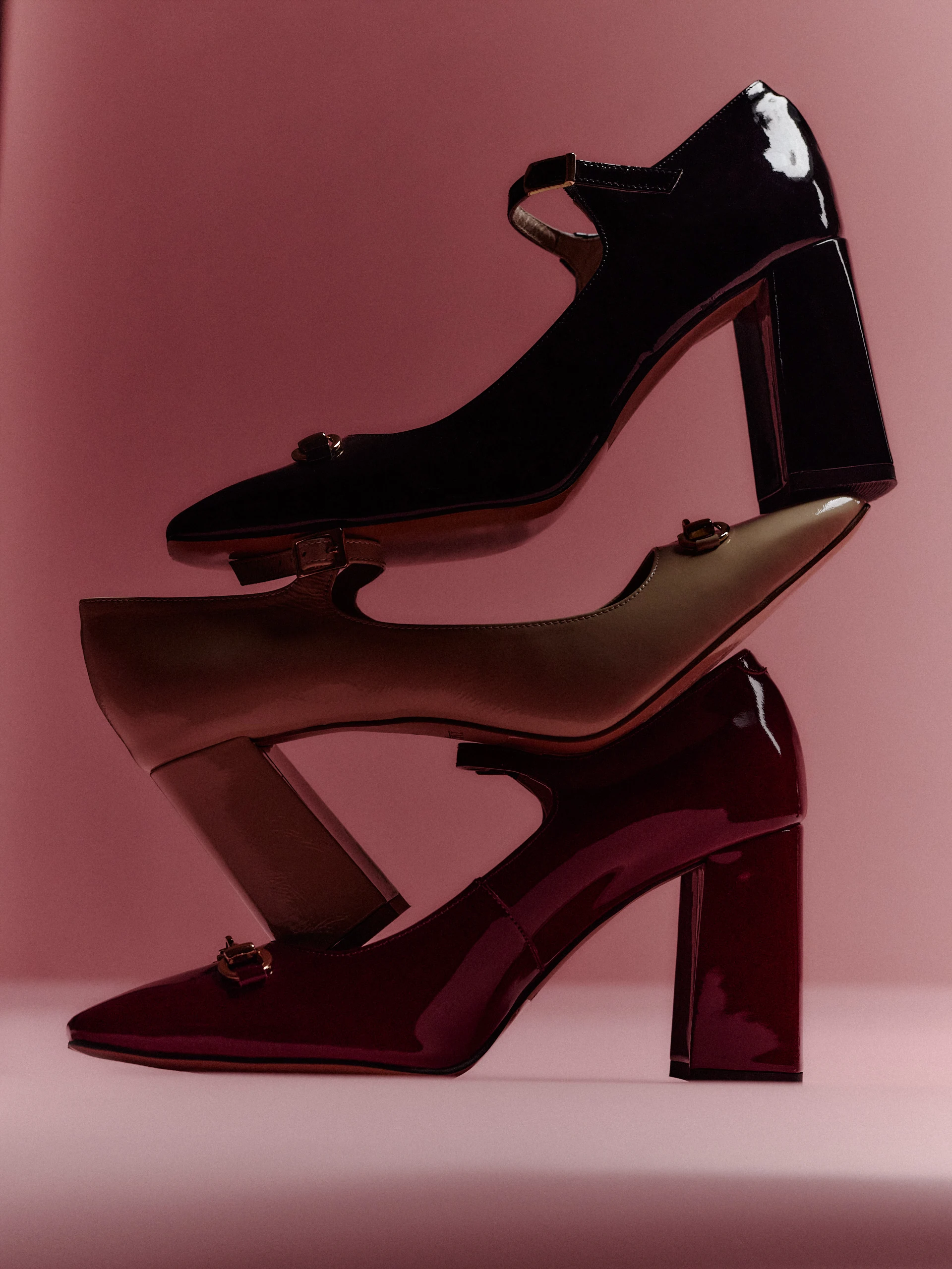 Black leather pumps with decorative buckles