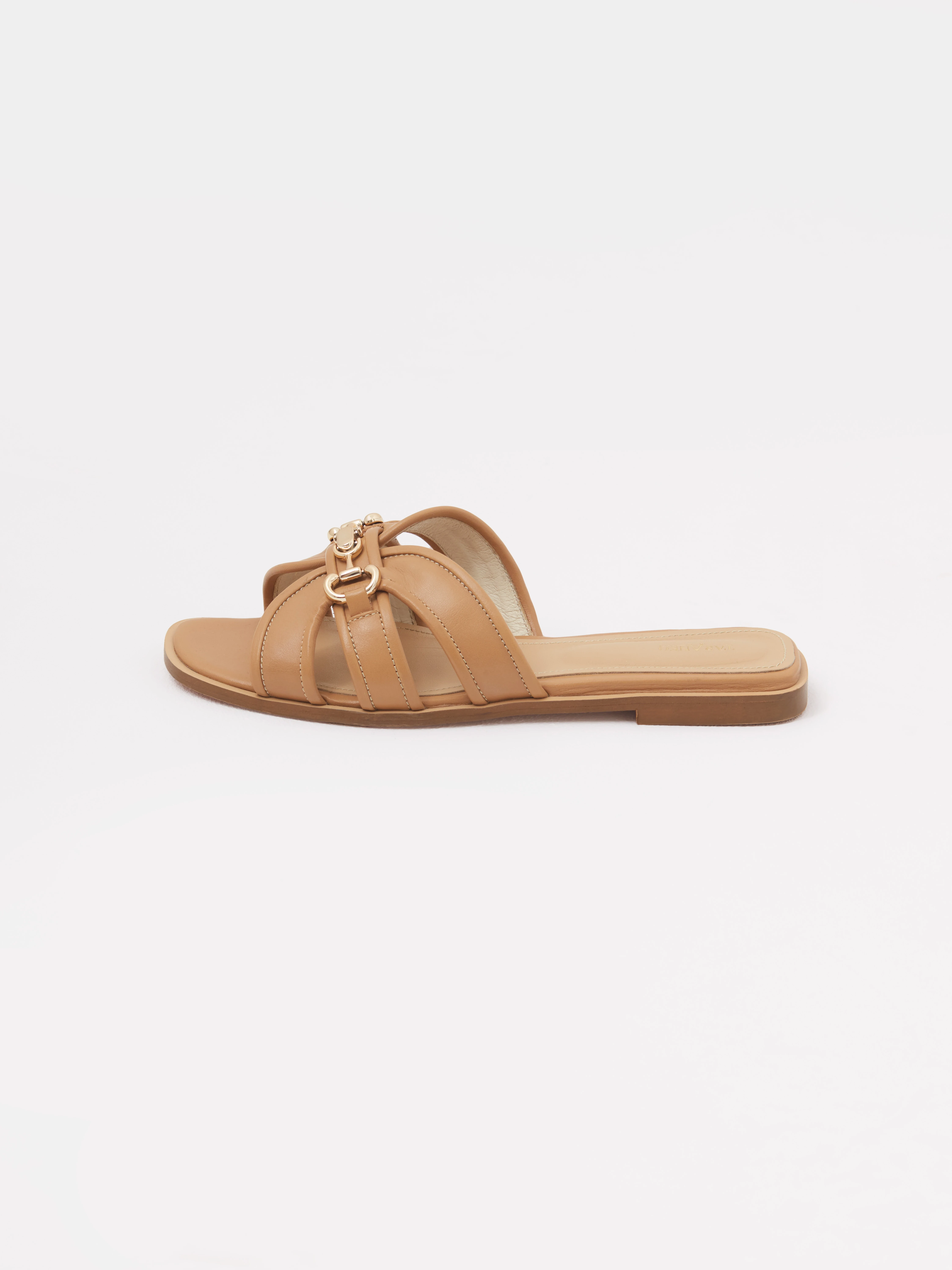 Caramel-colored leather flip-flops with a decorative buckle