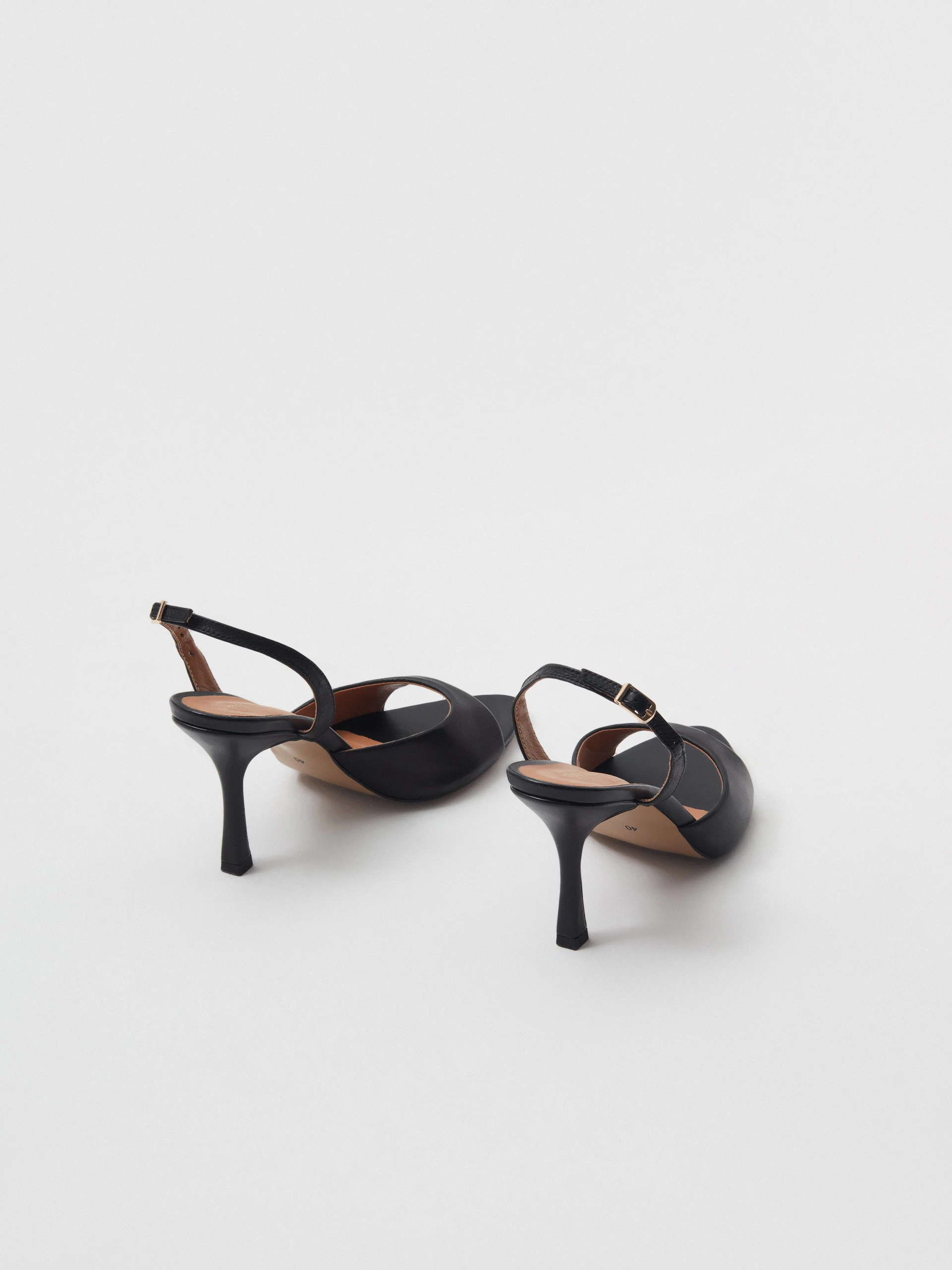 Black leather heeled sandals