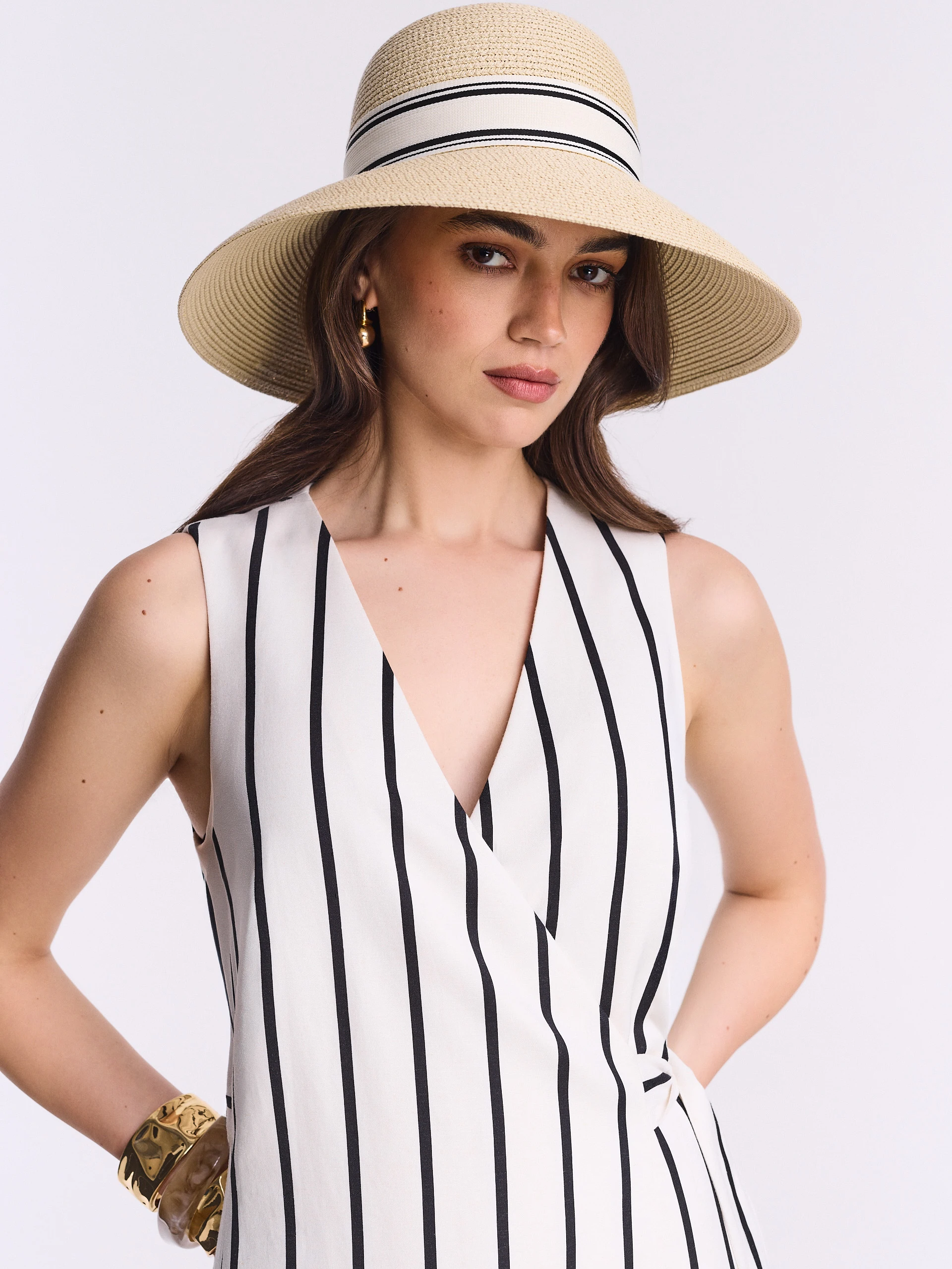 A large hat with a decorative ribbon