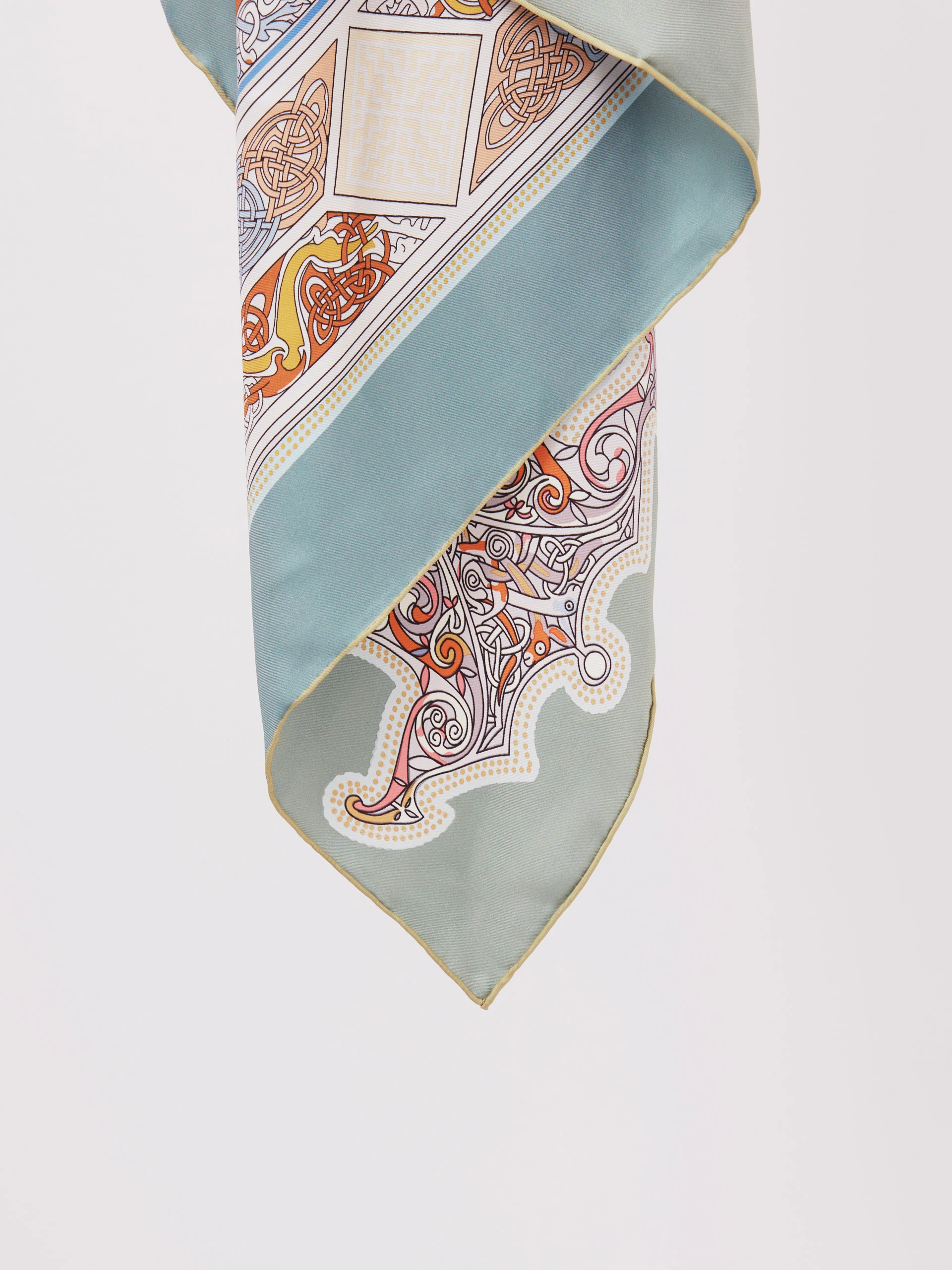 Double-sided silk scarf with hand-stitched edges
