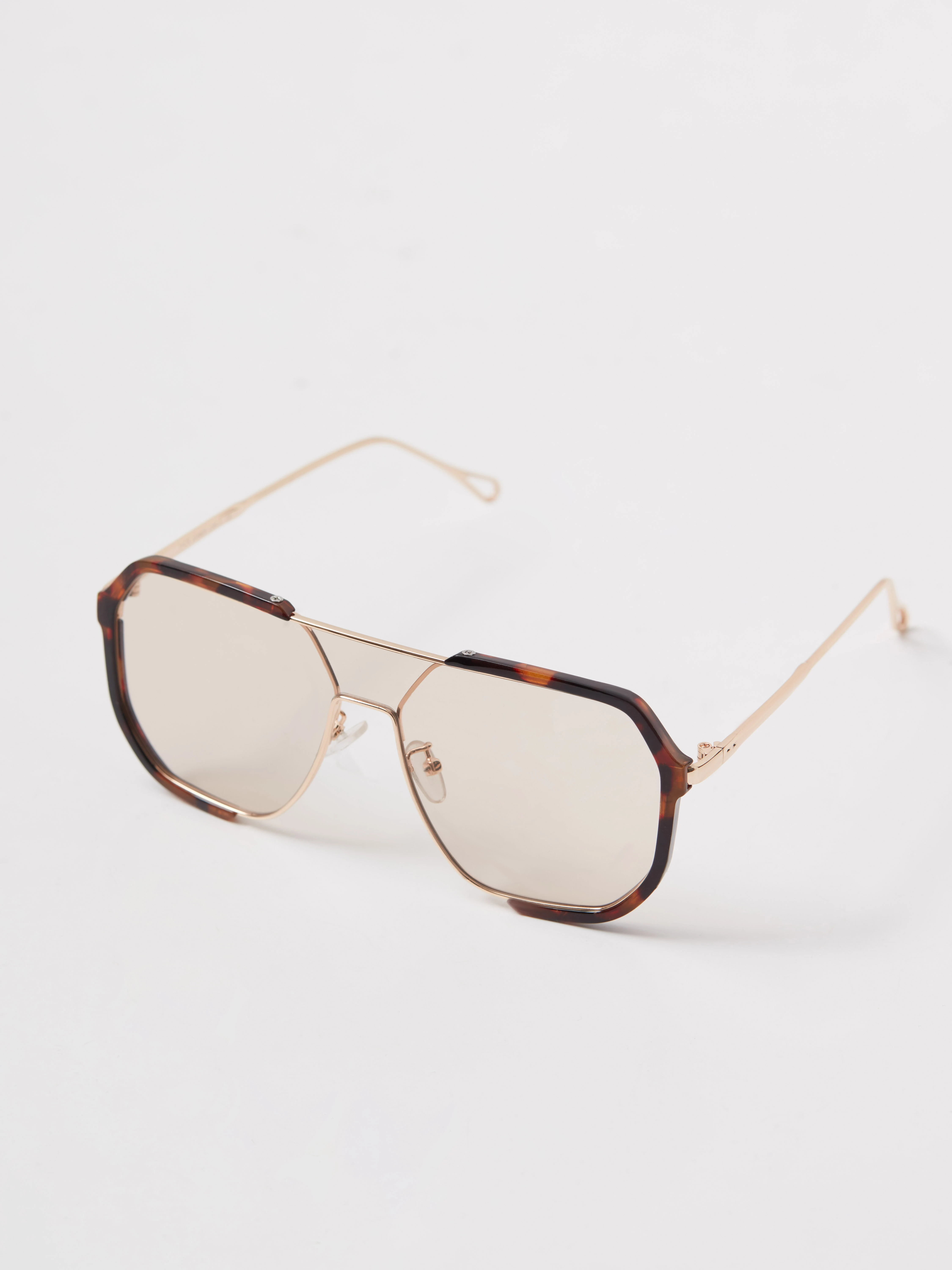 Gold sunglasses with animal-print frames