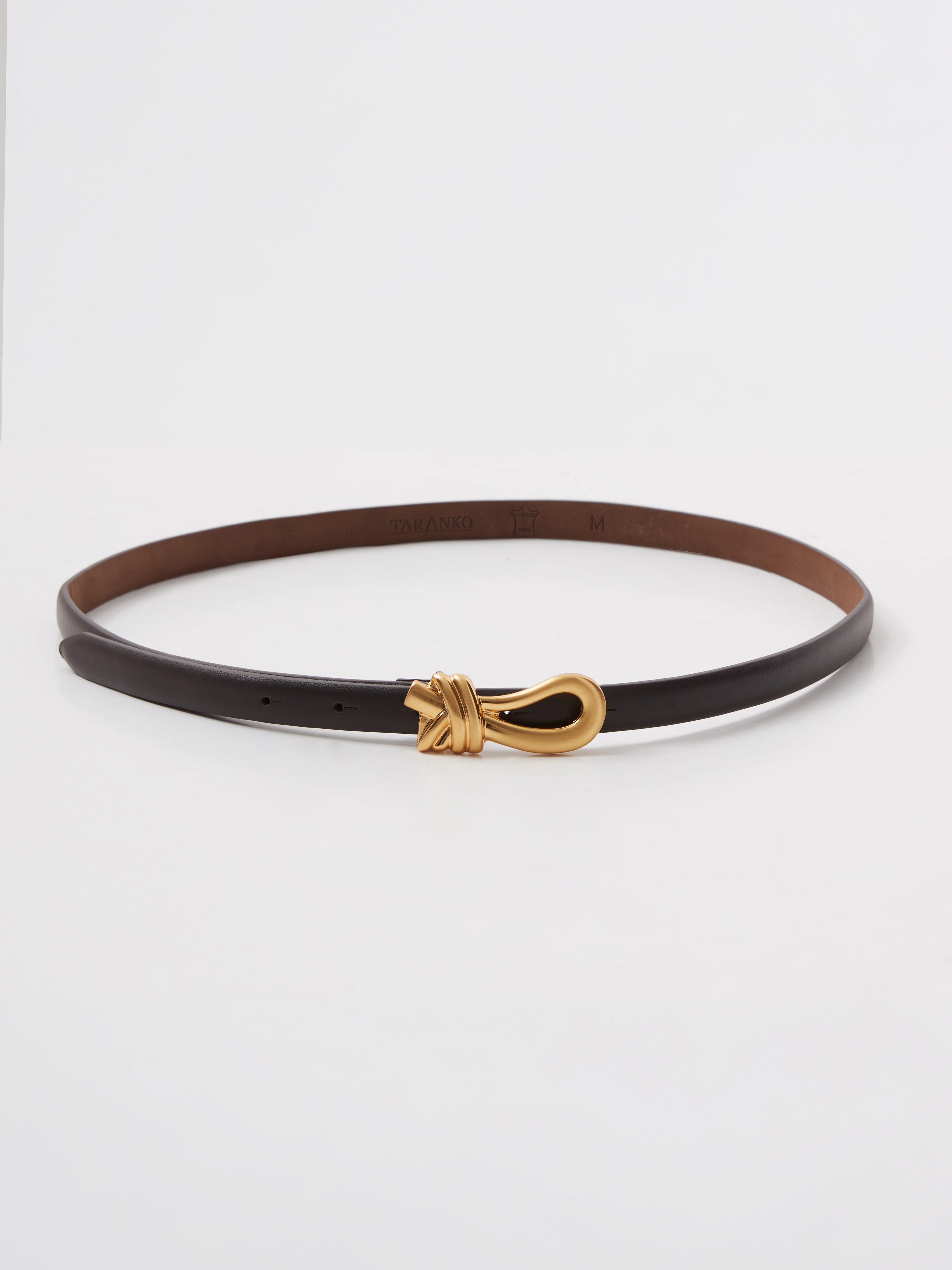 Leather belt with a decorative buckle
