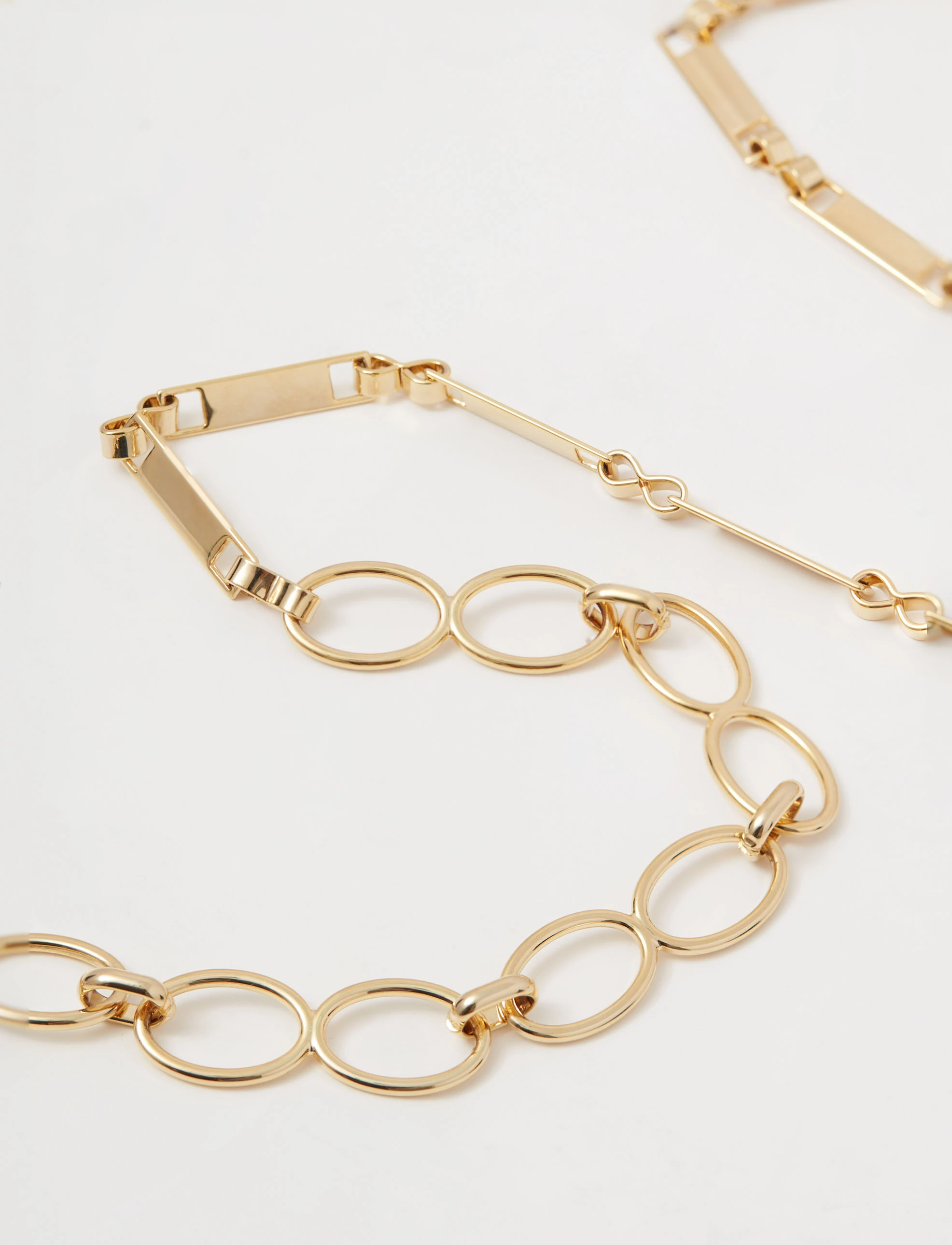 Gold-colored chain belt