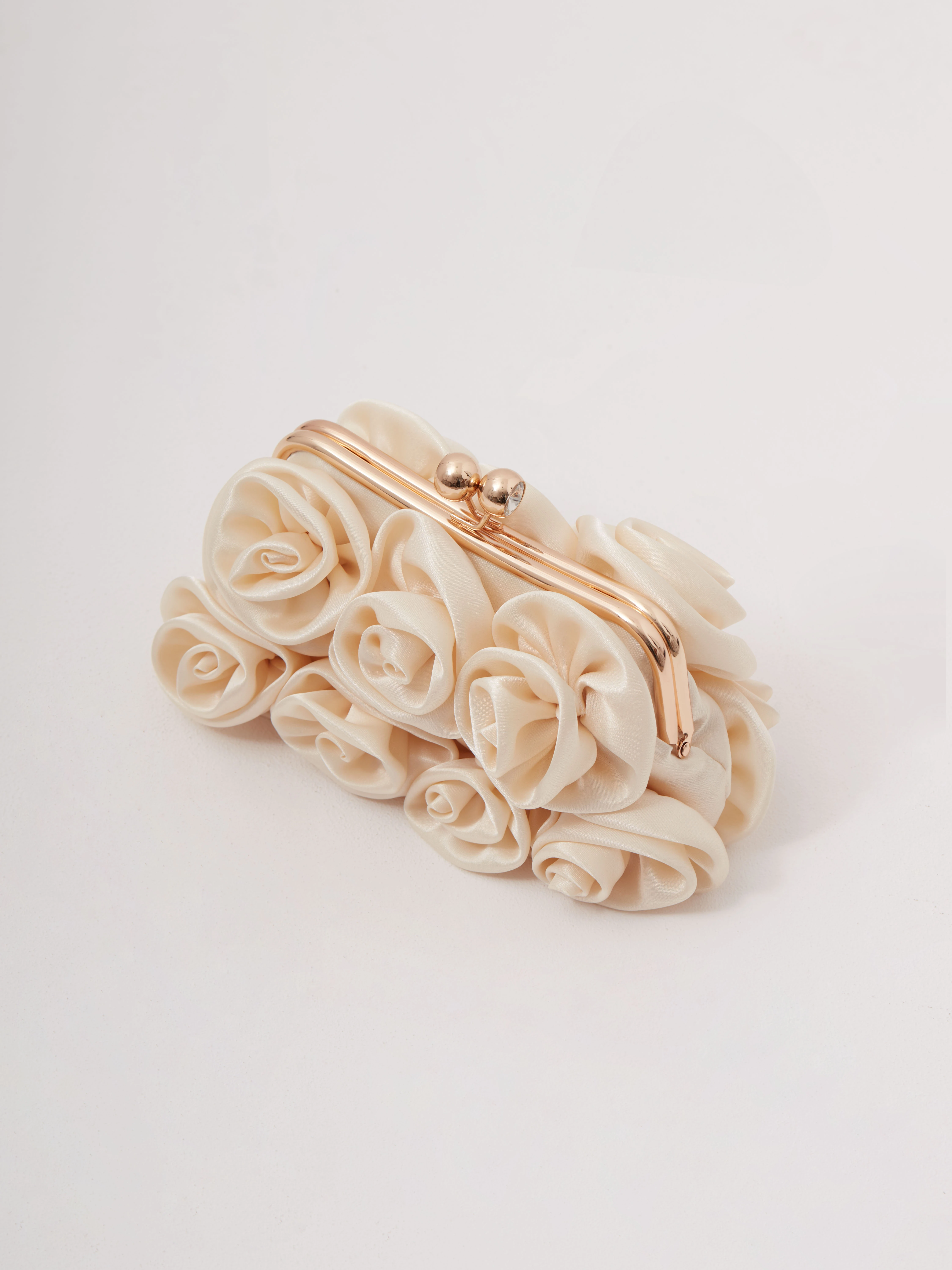 Cream-colored floral clutch