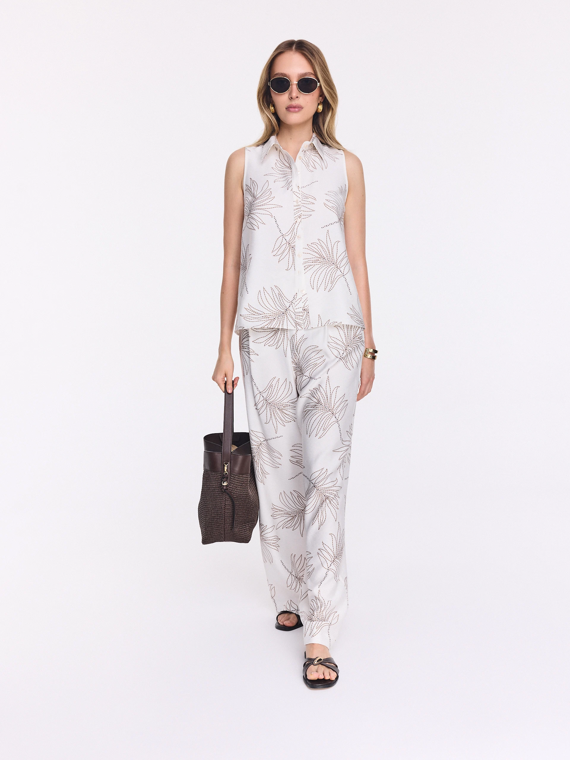 White wide-leg pants with a floral print