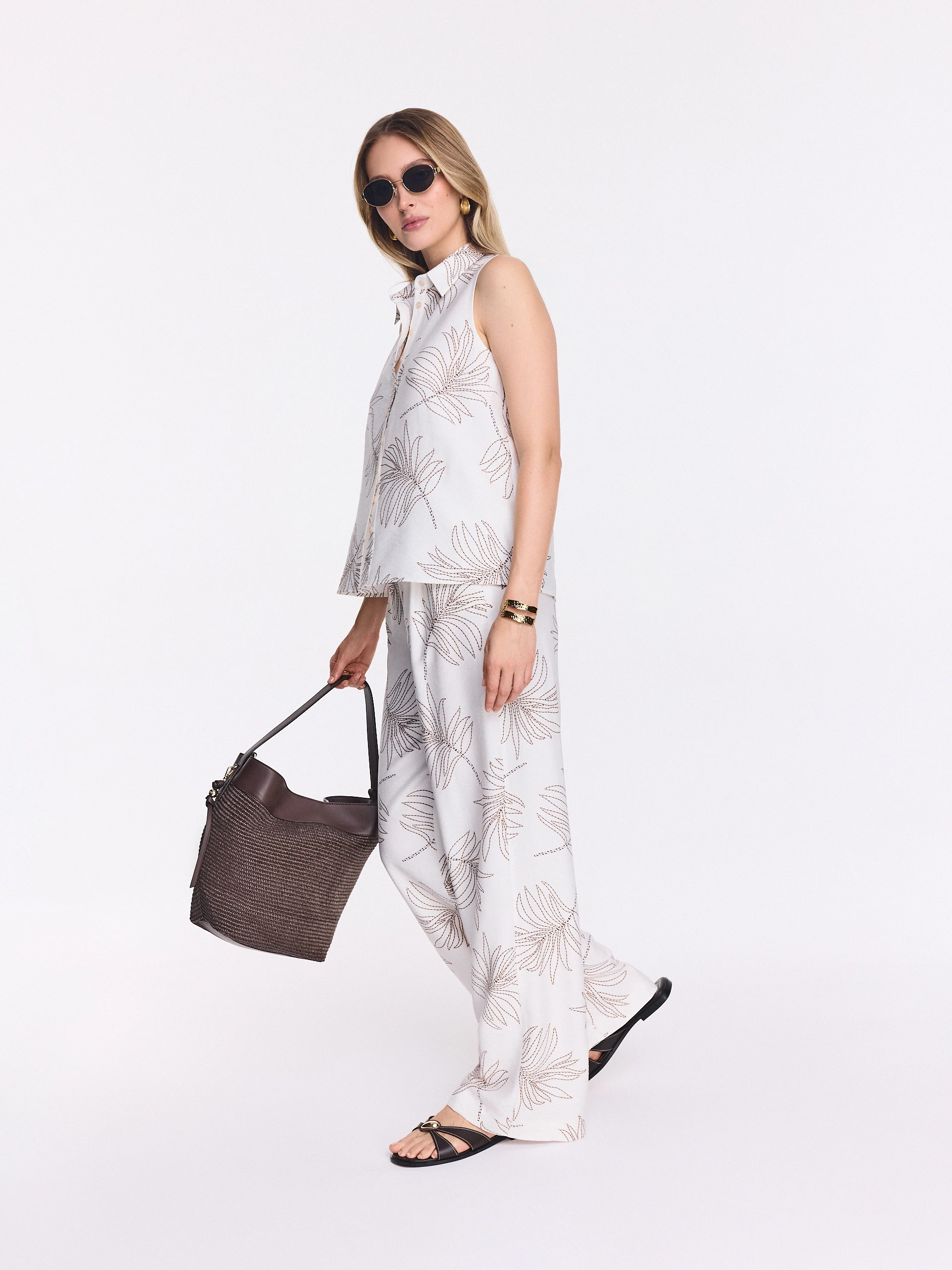 White wide-leg pants with a floral print