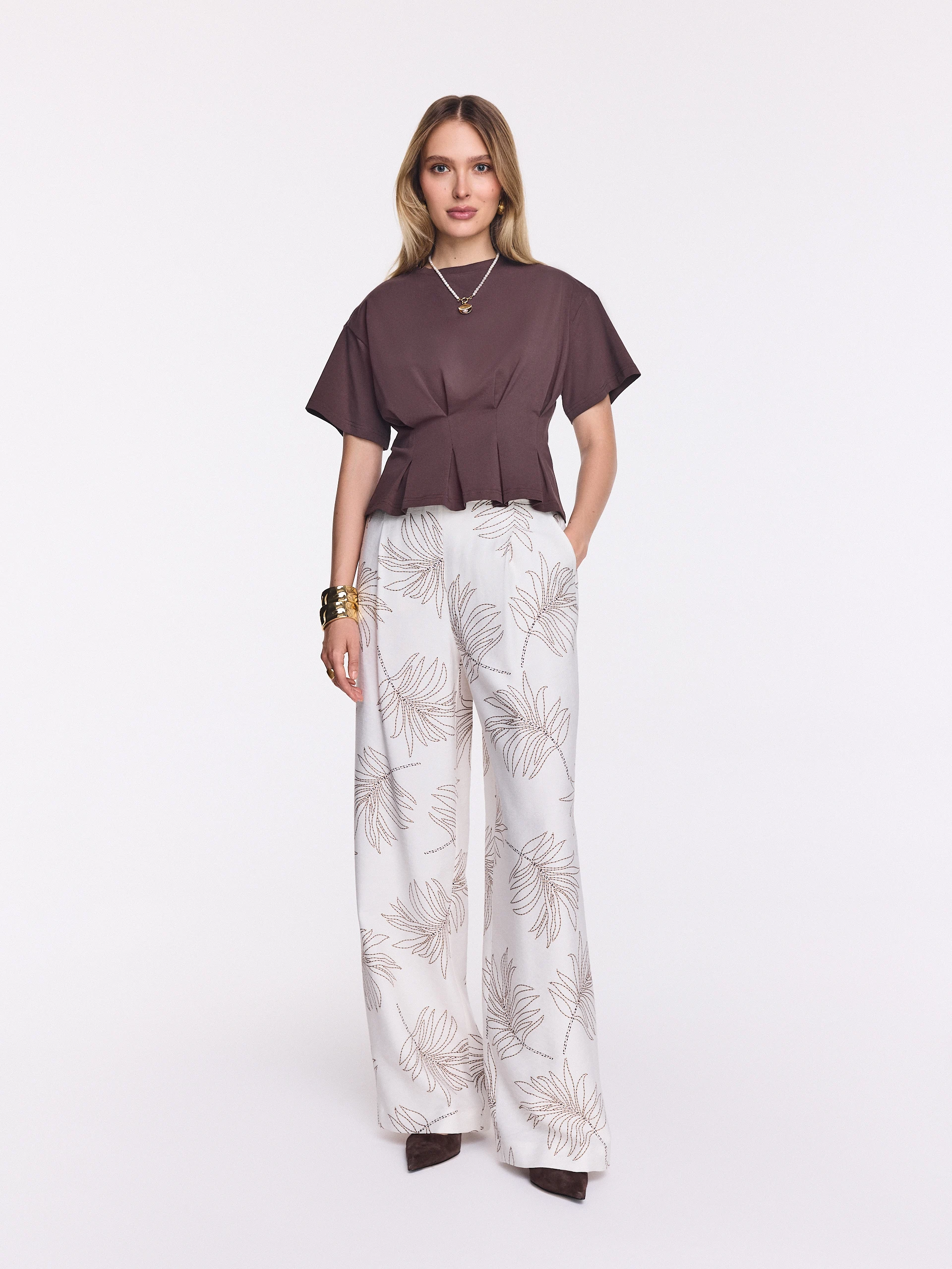White wide-leg pants with a floral print
