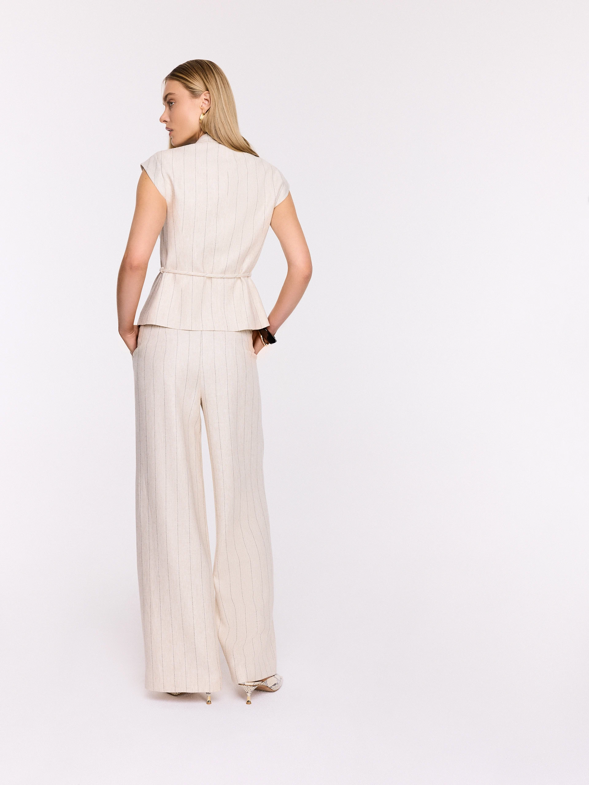 Light beige high-waisted ribbed trousers