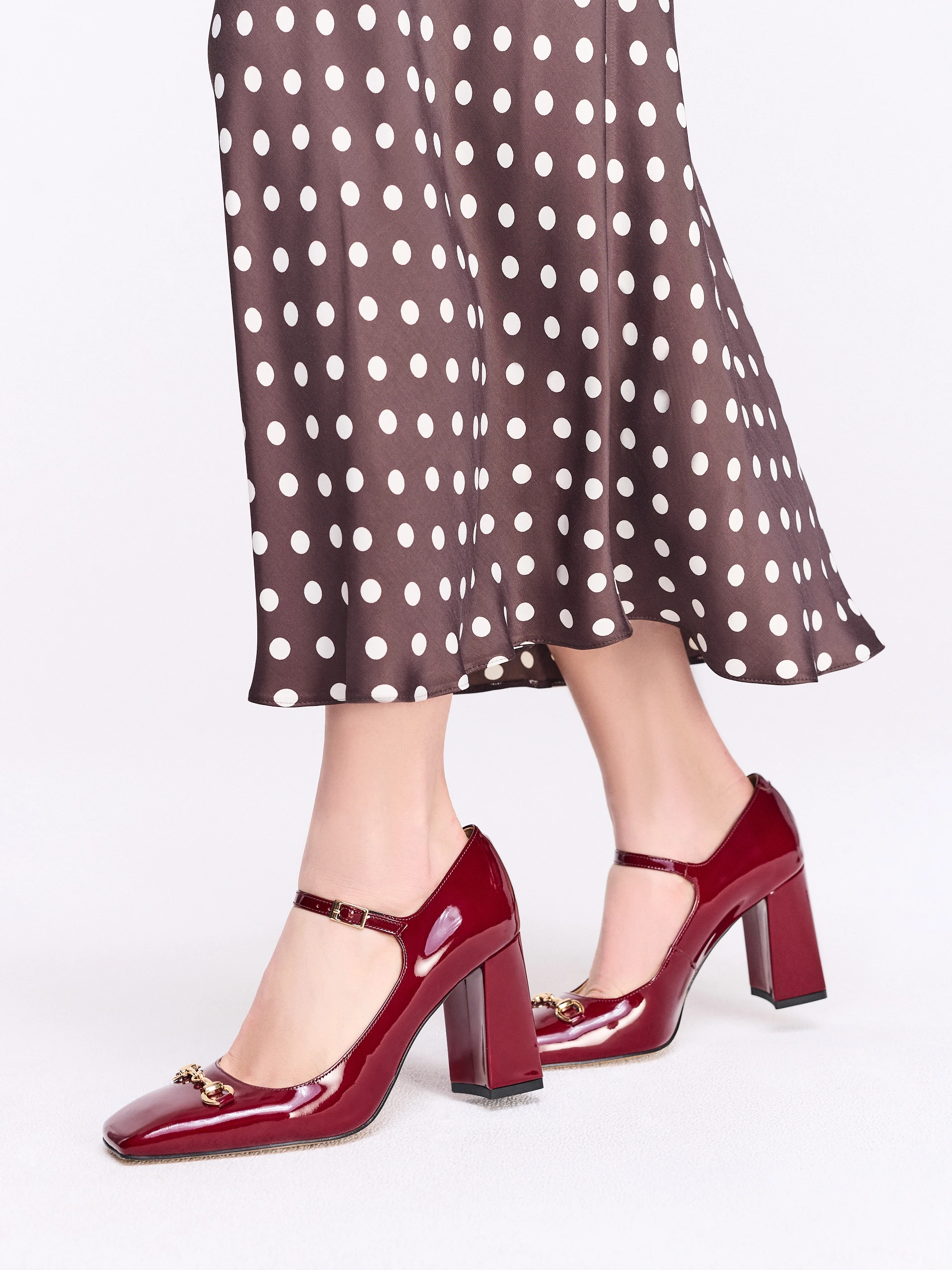 Brown midi skirt with polka dots made of satin viscose