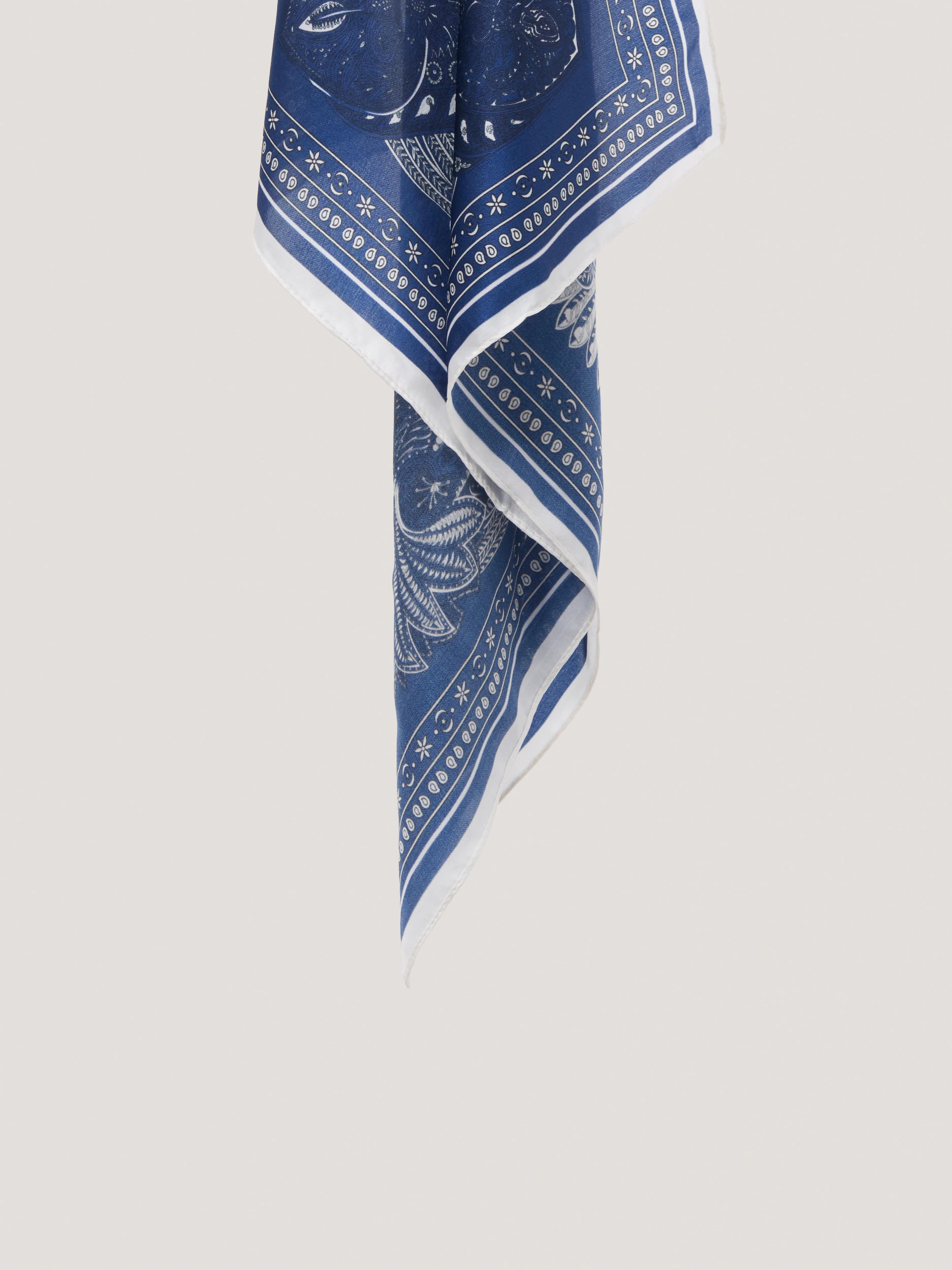 A silk scarf with a paisley pattern