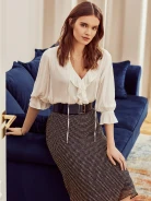PLEATED SKIRT WITH CHECKERED PATTERN