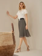 PLEATED SKIRT WITH CHECKERED PATTERN