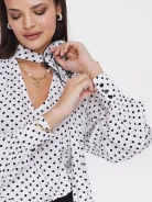 White shirt with black peas
