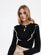Black sweater with decorative ruffles