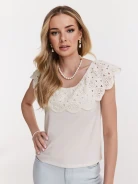 White blouse with lace embellishment at the neckline
