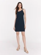 Navy blue minimalist dress with decorative clutch