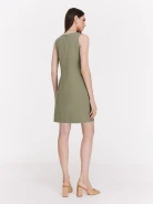 Green minimalist dress with decorative clutch