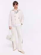 Cream pants with black piping