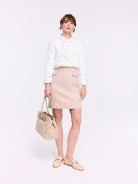Cream ribbed sweater with braided weave