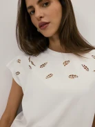 A white blouse with openwork detailing