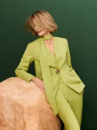 Green jacket with a sash and a jeweled button