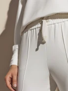 White blouse with pleats and frill