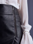 SHORT SKIRT MADE OF IMITATION LEATHER