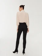 High-waisted black cigarette pants