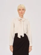 Cream blouse with a tie at the neck
