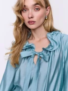 Blue shirt with frills and puffed sleeves