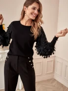 SWEATER WITH STRIKING SLEEVES