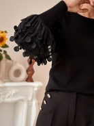SWEATER WITH STRIKING SLEEVES