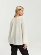 Loose white sweater with tied neckline
