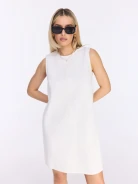 White cotton dress with a simple cut