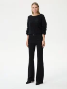 Black bell-bottom pants with shiny detail