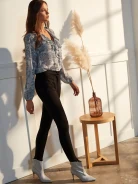 BLOUSE WITH RUFFLE AT NECKLINE