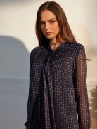 DRESS WITH A RUFFLE AT THE BOTTOM