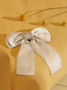 BEIGE BOW BROOCH
