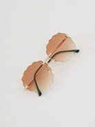 Brown sunglasses with fluted lenses