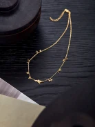 GOLD PLATED NECKLACE WITH PIGEON AND LEAVES