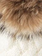 White cap with pom-pom