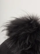 Black beret with decorative pom-pom