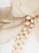 Earrings decorated with flowers and crystals
