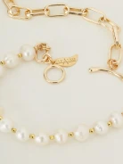 Asymmetrical necklace with pearls