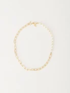 Asymmetrical necklace with pearls