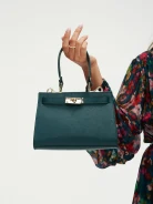 Elegant leather bag in green color