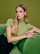 Gold-tone copper bracelet with green zircons